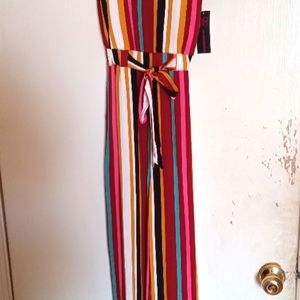 A cute one piece pants suit. Its an XS and never been worn.